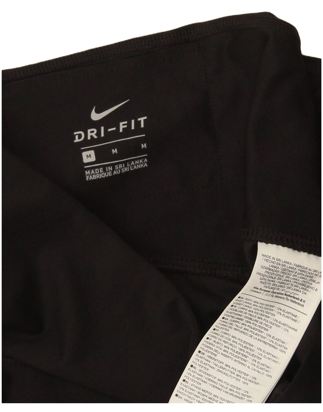 Nike - Leggings capri Dri Fit para mujer, talla 40, poliéster negro mediano