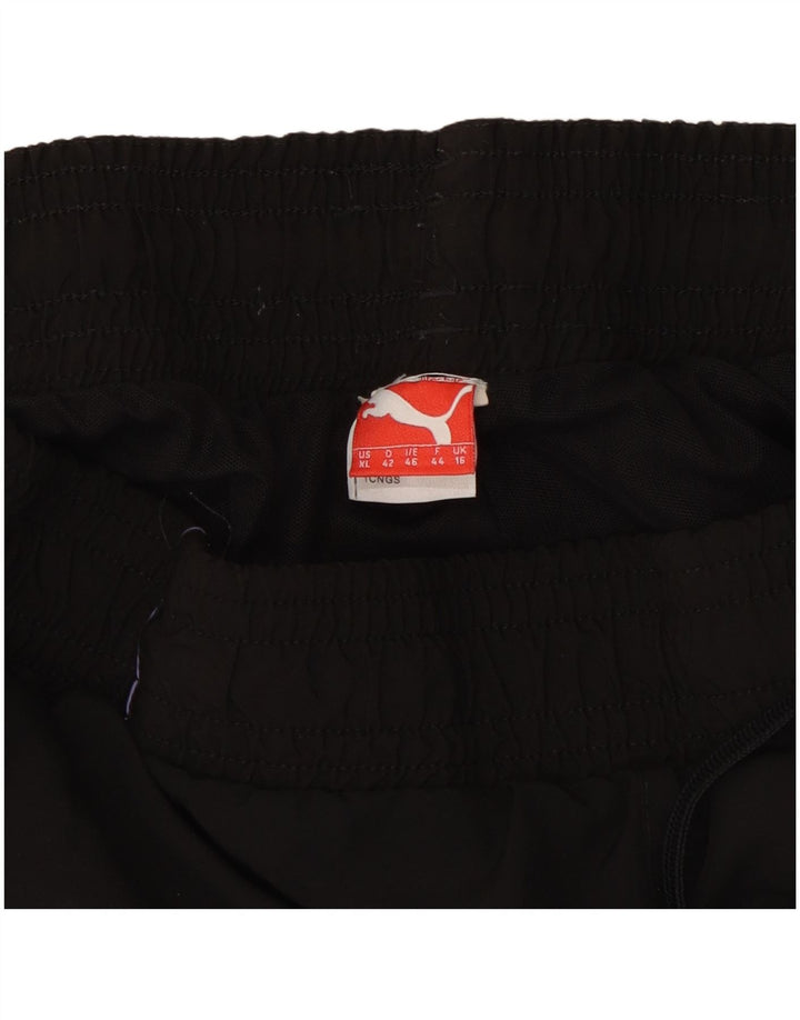 Puma - Pantalones de chándal para mujer, talla 40, color negro
