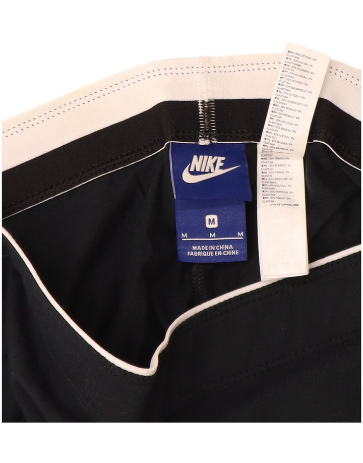 Nike - Leggings gráficos para mujer (talla 40), algodón negro mediano