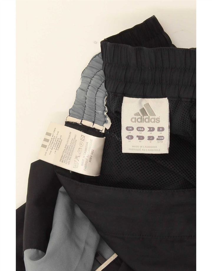 Adidas - Pantalones cortos deportivos con estampado gráfico para hombre, color negro medio, poliéster con bloques de color