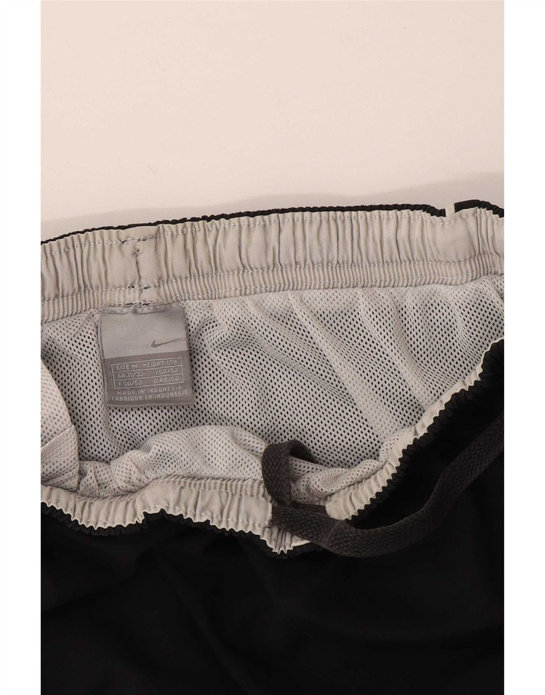 Nike - Pantalones cortos deportivos para mujer, talla 40, talla M, poliéster negro