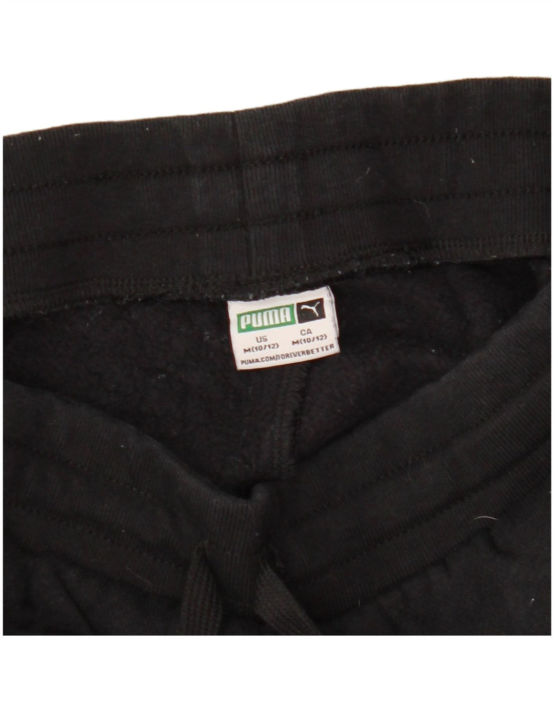 PUMA Pantalones de chándal con estampado gráfico para niños de 10 a 11 años, mediano, negro