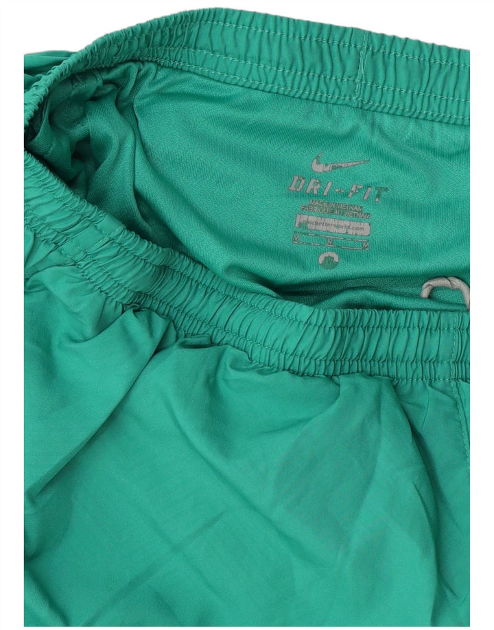 Nike - Pantalones cortos deportivos Dri Fit para mujer, talla 40, color verde medio