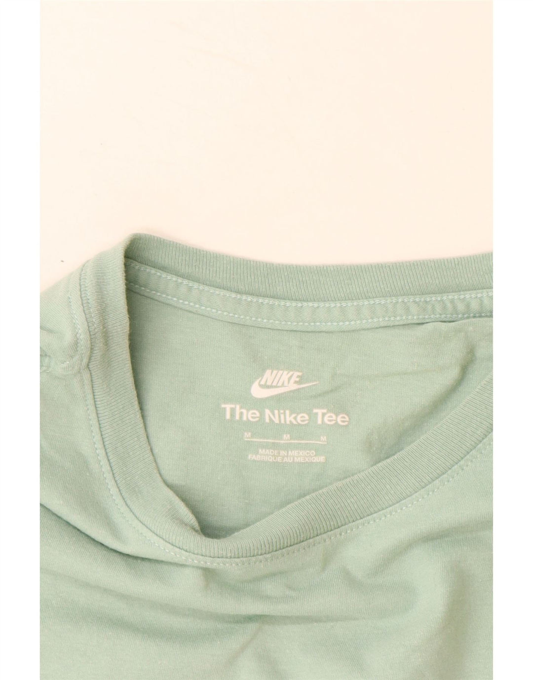 NIKE Camiseta de corte regular con gráfico para hombre, color turquesa medio