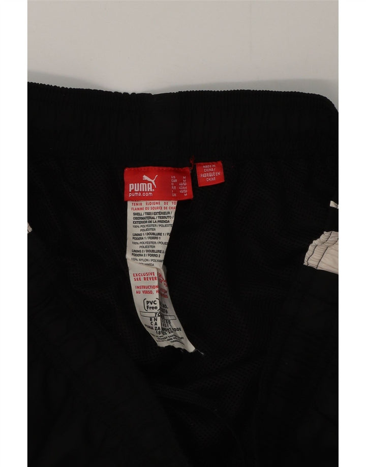 Pantalones de chándal PUMA para hombre Poliéster color block mediano negro