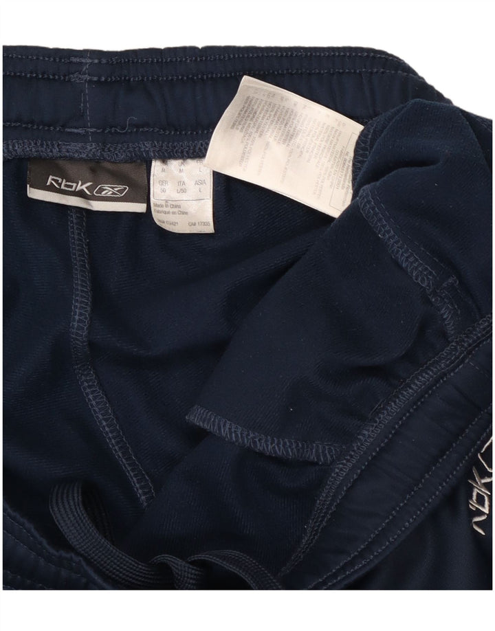 Pantalones de chándal Reebok Hombre Azul marino medio Colorblock Poliéster