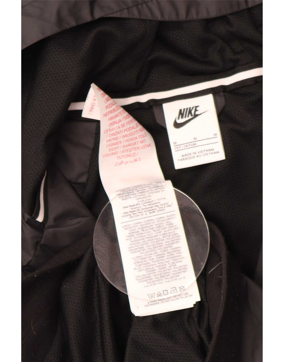Nike Chaqueta impermeable con capucha para niños 10-11 años Mediana Negro Poliéster