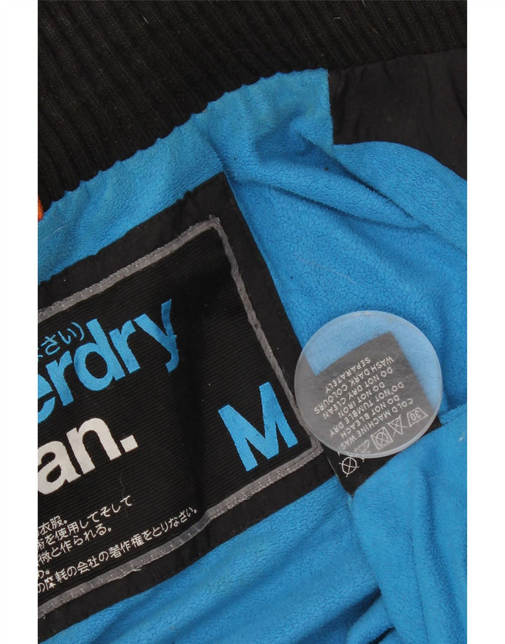 Superdry Chaqueta cortavientos con capucha y gráfico para hombre UK 38 Medium Black Nylon