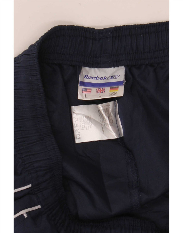Reebok - Pantalón de chándal gráfico para hombre, talla grande, poliéster, azul marino