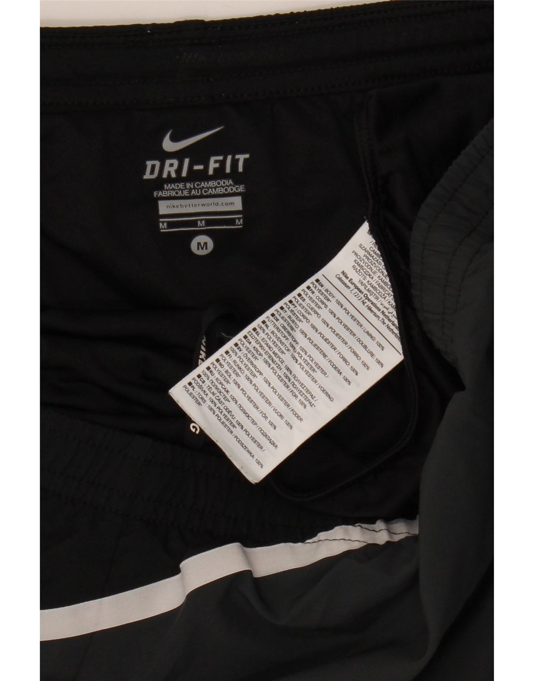 Nike - Pantalones cortos deportivos Dri Fit para mujer, talla M, poliéster negro