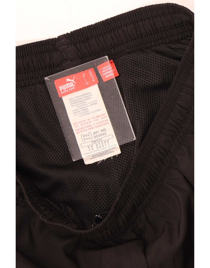 Puma Pantalones de chándal para niño Graphic 13-14 años Negro Poliéster