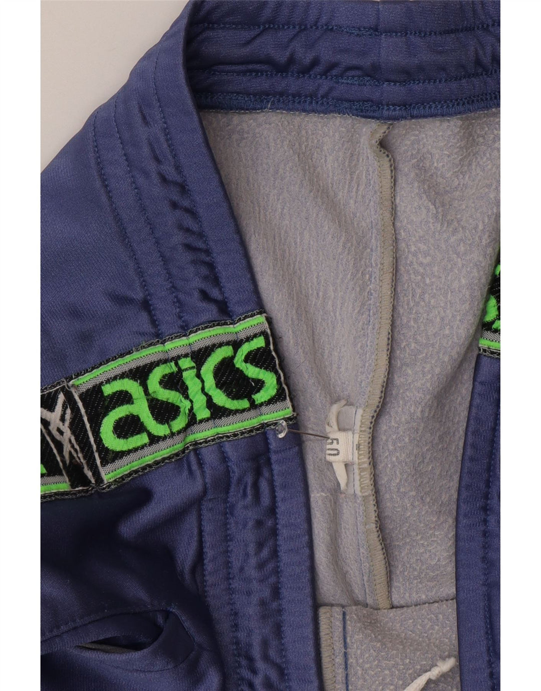 ASICS Pantalón de chándal gráfico para hombre IT 50 Large Púrpura