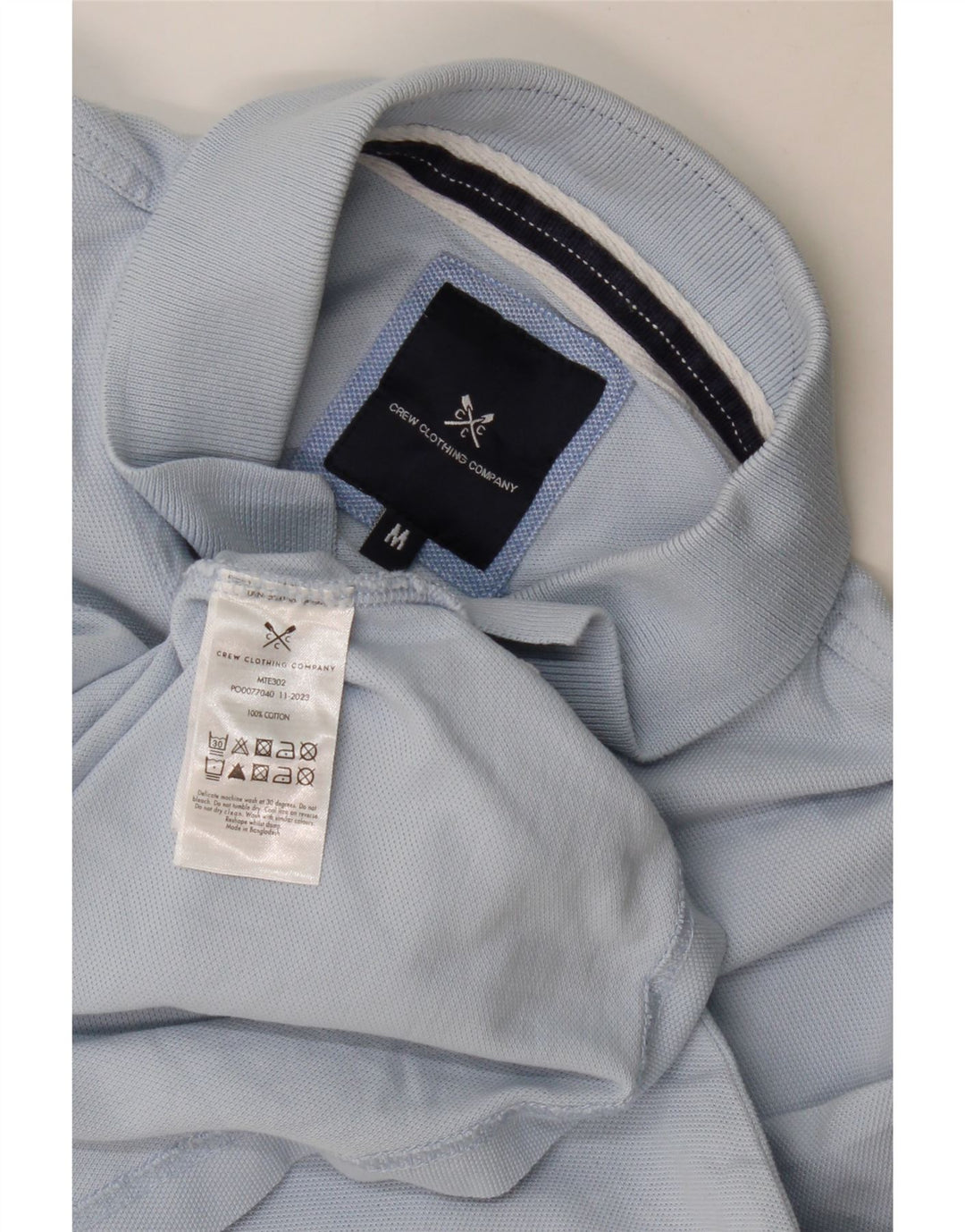 Crew Clothing Polo para hombre de algodón azul medio