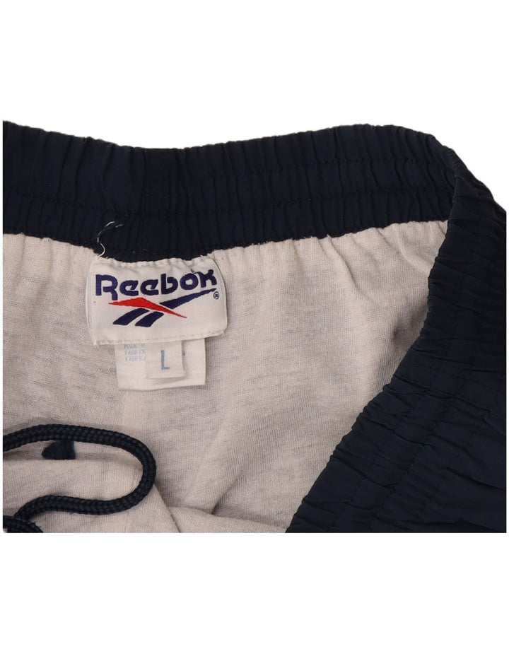 Reebok - Pantalones cortos deportivos para hombre, talla grande, nailon azul marino