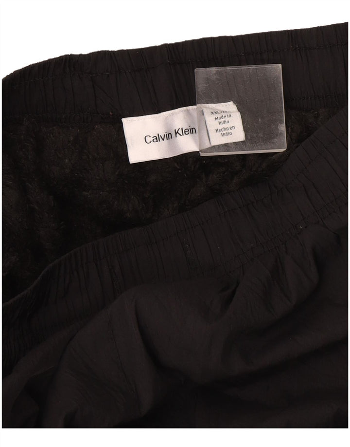 Calvin Klein Pantalones cortavientos gráficos para hombre 2XL Negro