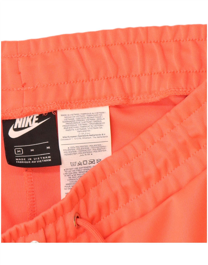 Nike Pantalones cortos deportivos gráficos para mujer UK 44 Poliéster naranja medio