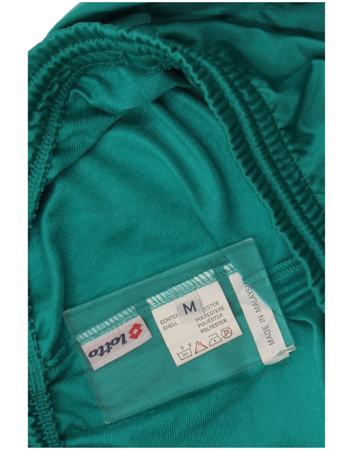 Pantalones De Chándal Lotto Hombre Turquesa Medio Poliéster