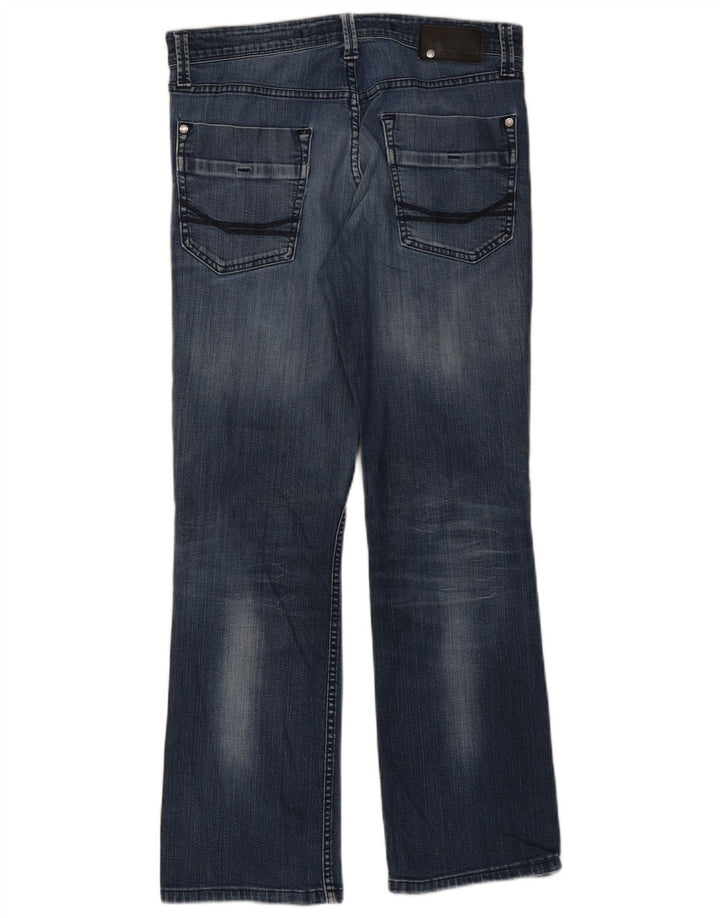 Calvin Klein Jeans desgastados con corte de bota para mujer W33 L29 Algodón azul
