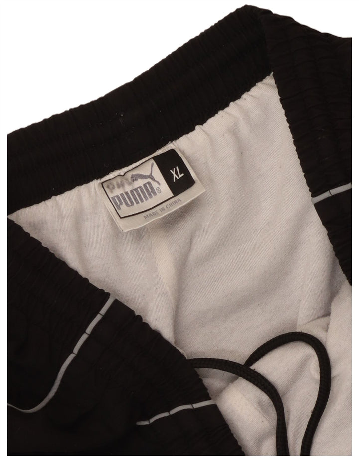 Puma Pantalones De Chándal Gráfico Hombre XL Poliéster Negro