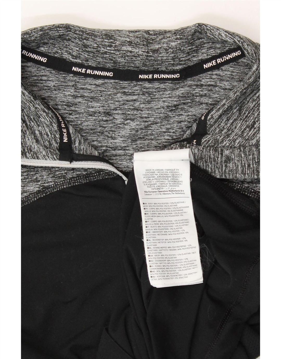 NIKE Womens Zip Neck Pullover Tracksuit Top UK 10 Small Black Flecked Vintage Nike and Second-Hand Nike from Messina Hembry 