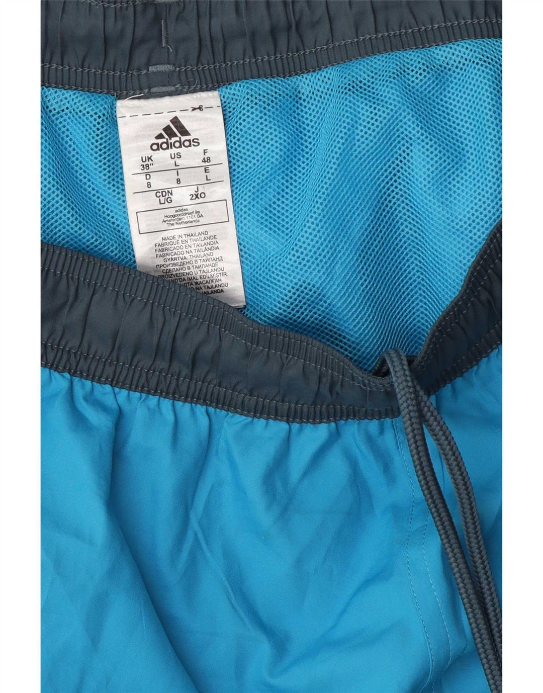 Adidas Pantalones cortos deportivos con estampado gráfico para hombre Poliéster color block azul grande
