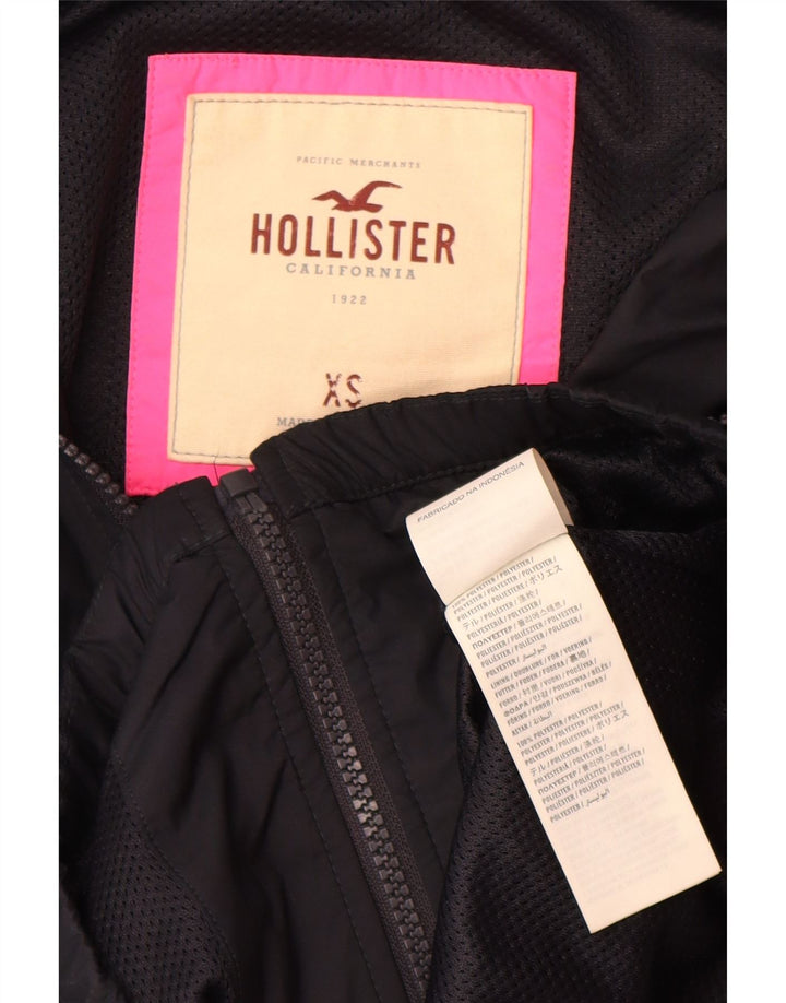 Chaqueta impermeable con capucha Hollister para mujer UK 6 XS Poliéster negro