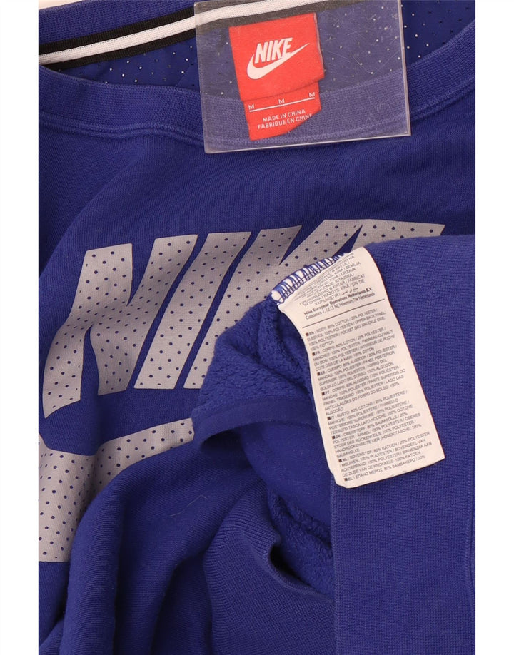 Nike Hombre Sudadera con gráfico tipo jersey de algodón color block en azul medio