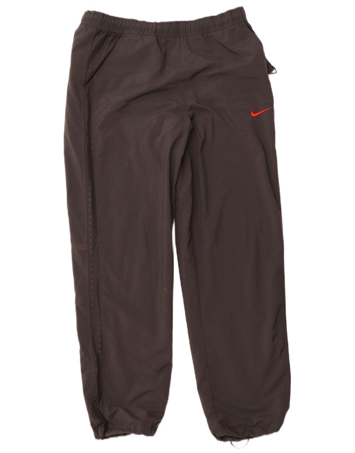 NIKE Hombre Pantalones de Chándal Joggers Gris Medio Poliéster