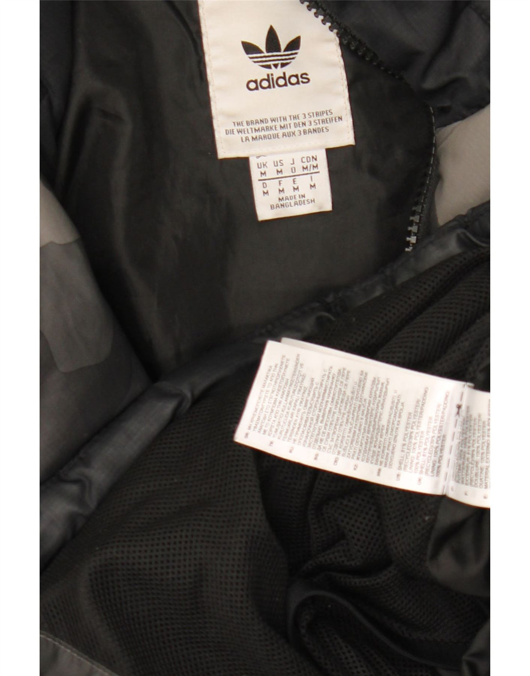 Adidas Chaqueta acolchada con capucha gráfica para hombre UK 38 Camuflaje gris medio