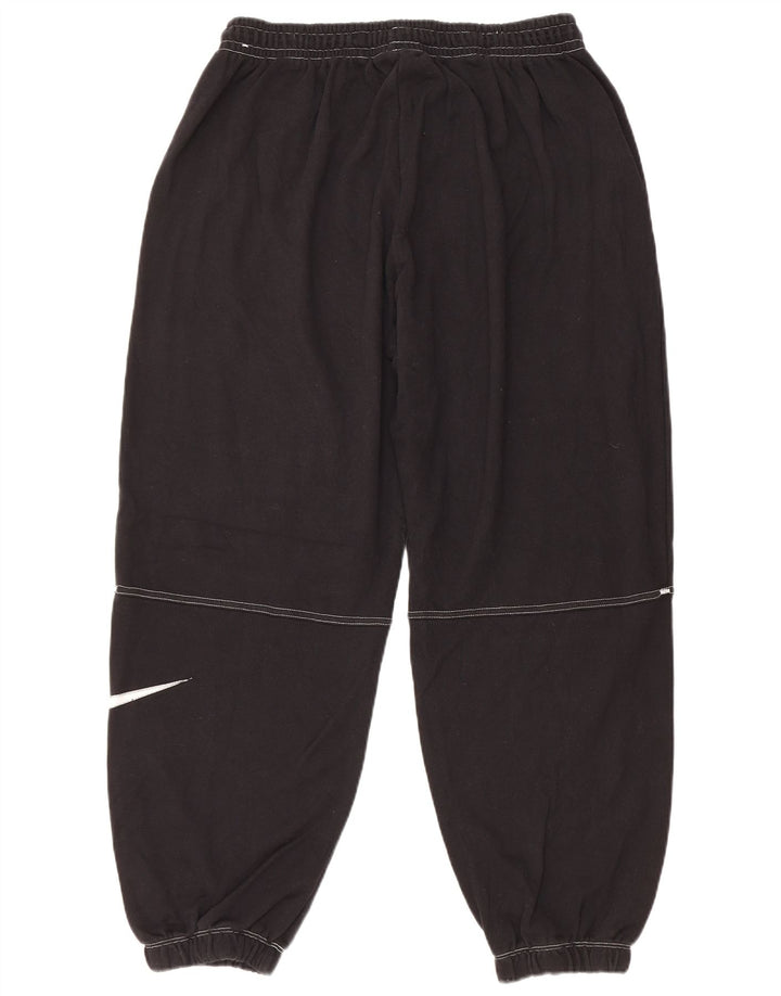 Nike - Pantalones de chándal con gráfico para hombre, color negro