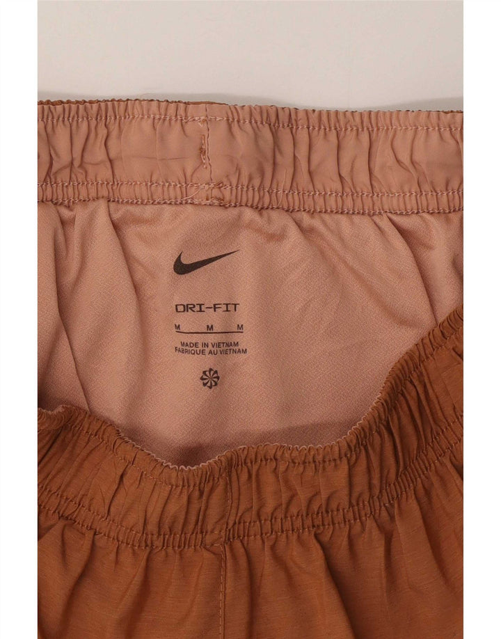 Nike - Pantalones cortos deportivos para mujer (talla 40), color marrón medio, poliéster