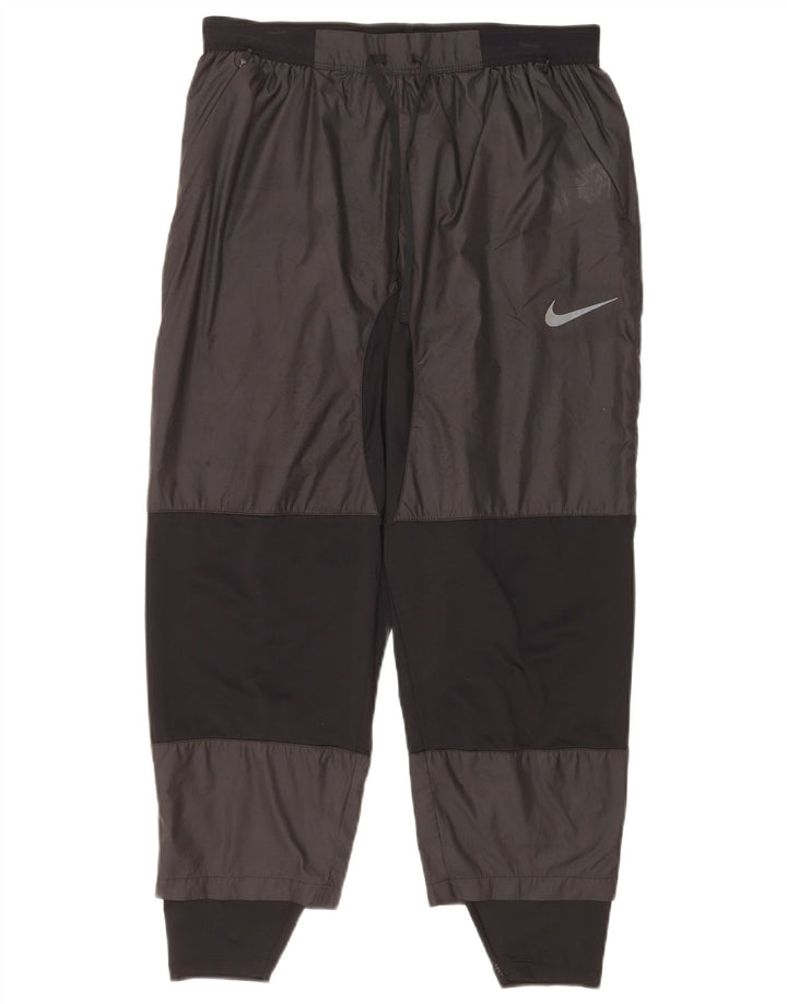 Nike - Pantalón de chándal para hombre (talla grande), color negro, poliéster