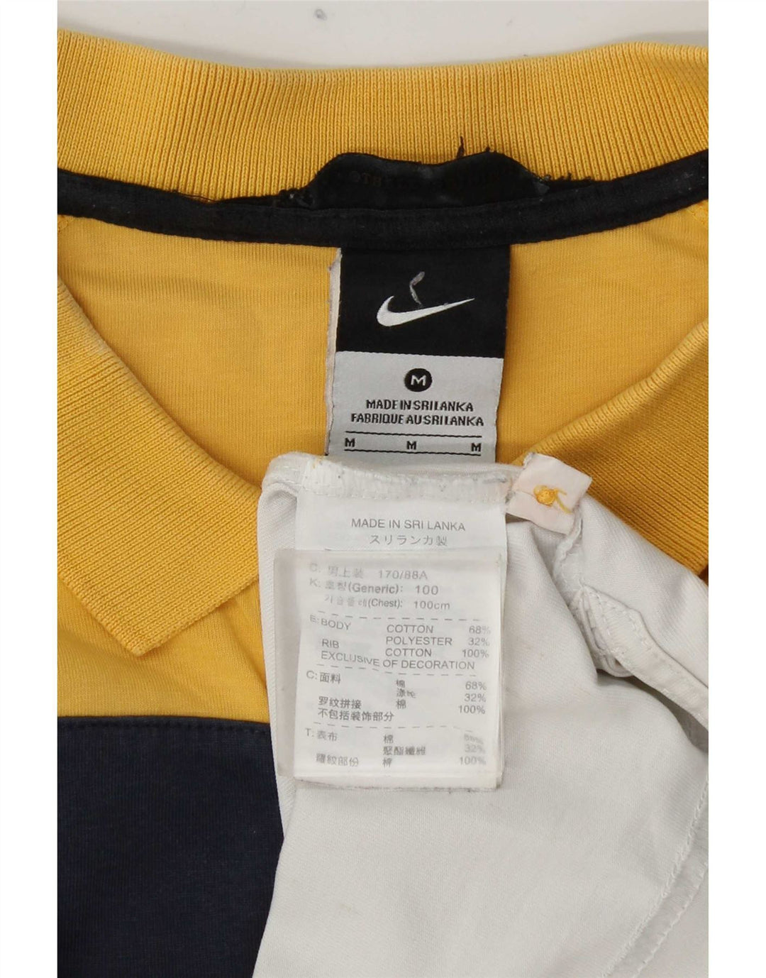 Nike Polo gráfico para hombre de algodón color block en amarillo medio