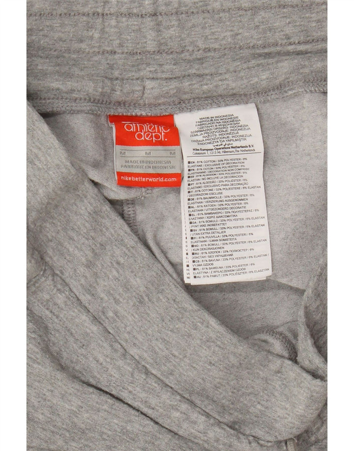 Nike - Pantalones de chándal para mujer, talla 40, algodón gris medio