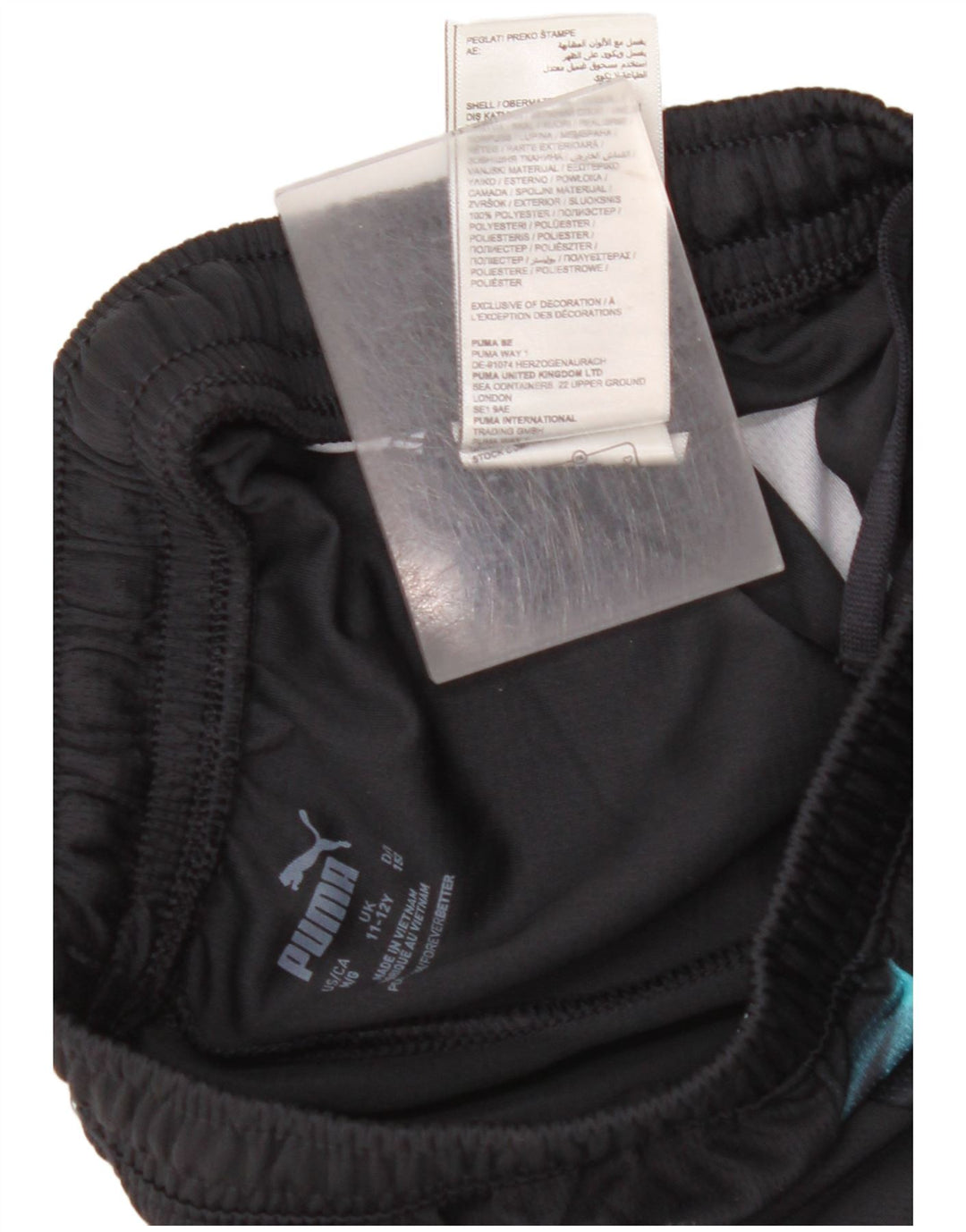 PUMA Pantalones cortos deportivos Manchester City para niños 11-12 años Bloque de color negro