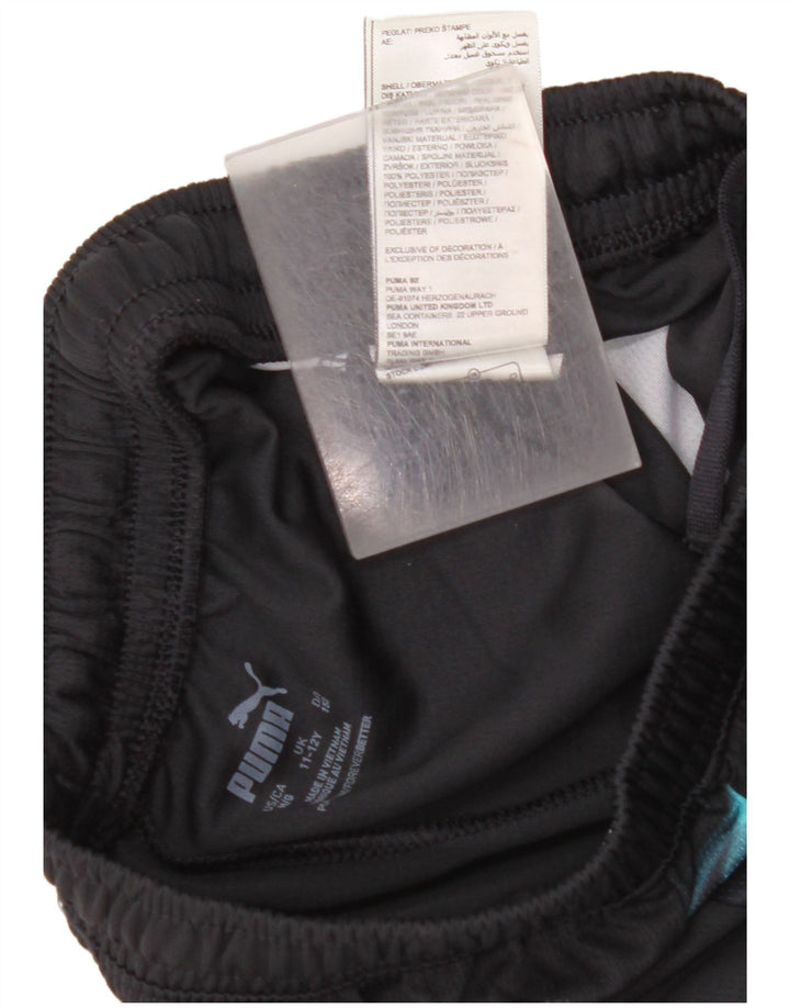 PUMA Pantalones cortos deportivos Manchester City para niños 11-12 años Bloque de color negro