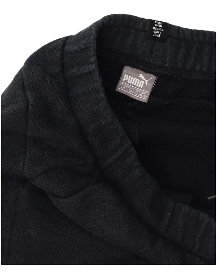 Puma Pantalones de chándal con gráfico para niños 11-12 años Negro