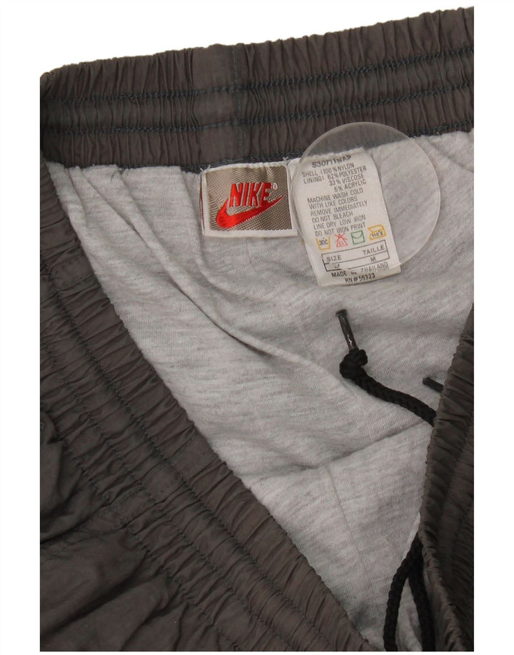 Pantalón De Chándal Nike Hombre Joggers Nylon Gris Medio