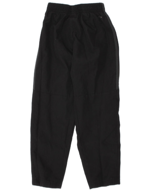 Adidas Pantalones de chándal con gráfico del Real Madrid para niños, 4-5 años, Negro