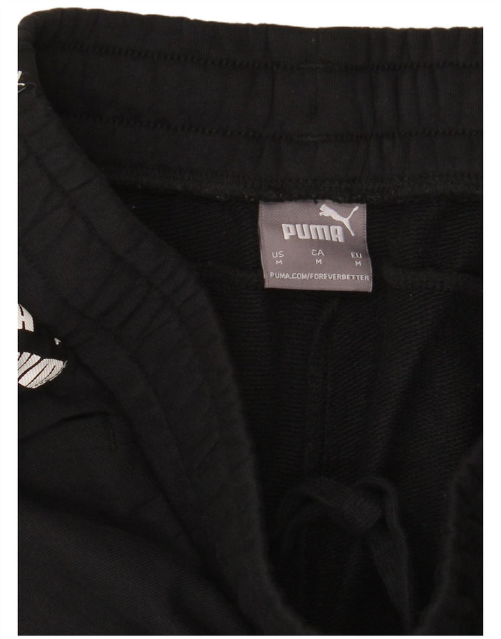 PUMA Shorts deportivos con estampado gráfico para hombre, color negro mediano