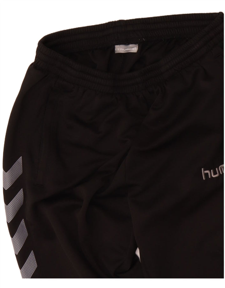 HUMMEL Pantalones de chándal con estampado gráfico para hombre Poliéster negro mediano