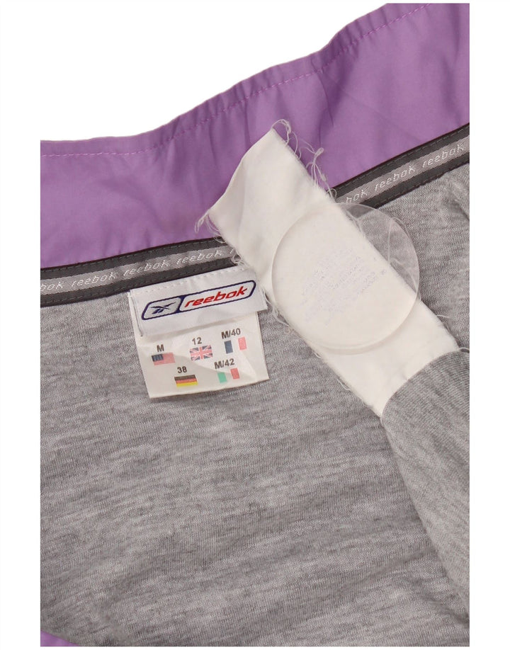 Reebok Chaqueta de chándal para mujer UK 12 Mediana Púrpura Poliéster