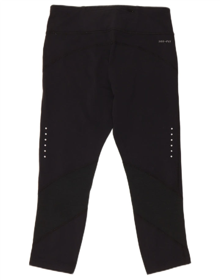Nike - Leggings capri Dri Fit para mujer, talla M, nailon negro