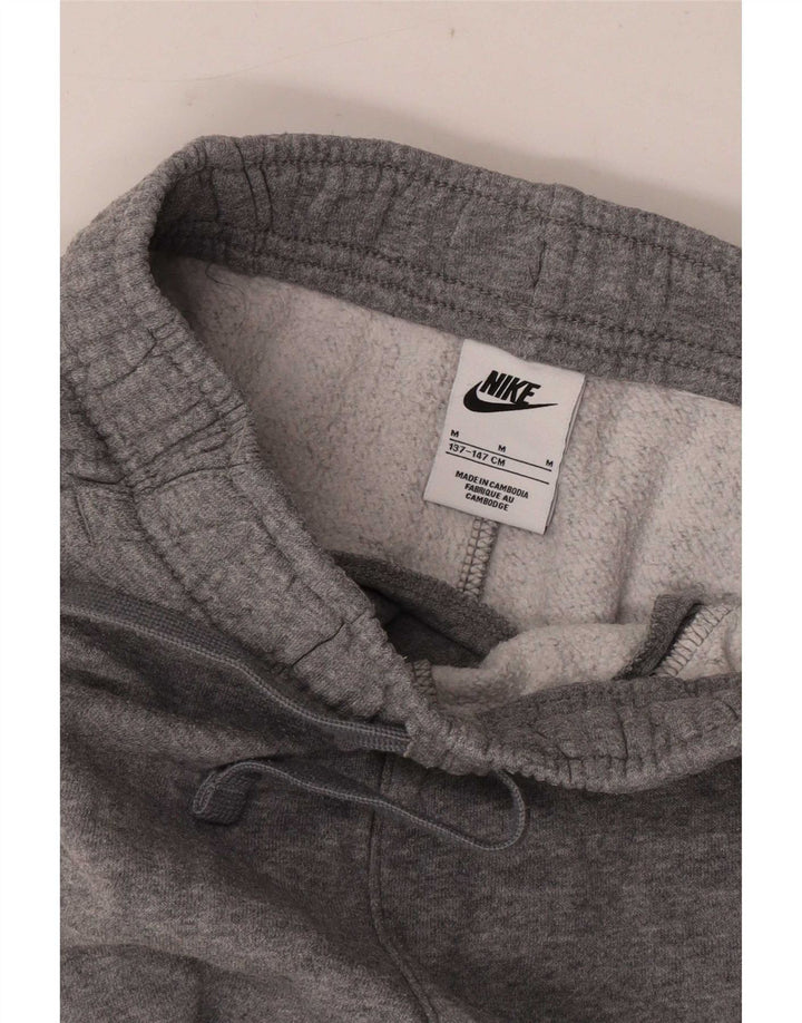 Nike - Pantalón de chándal para niño, 10-11 años, color gris medio