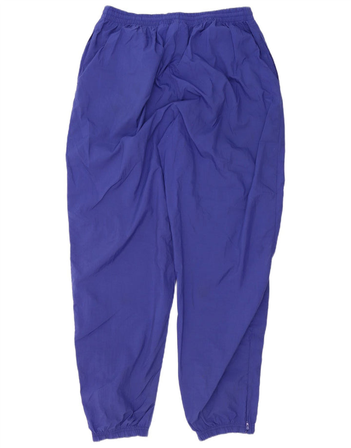 REEBOK Pantalón de Chándal Hombre Joggers XL Poliéster Morado