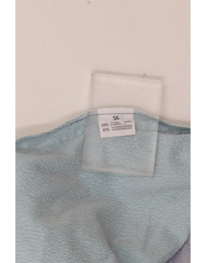 ASICS Hombre Pantalones de chándal con gráfico de poliamida color block en azul medio