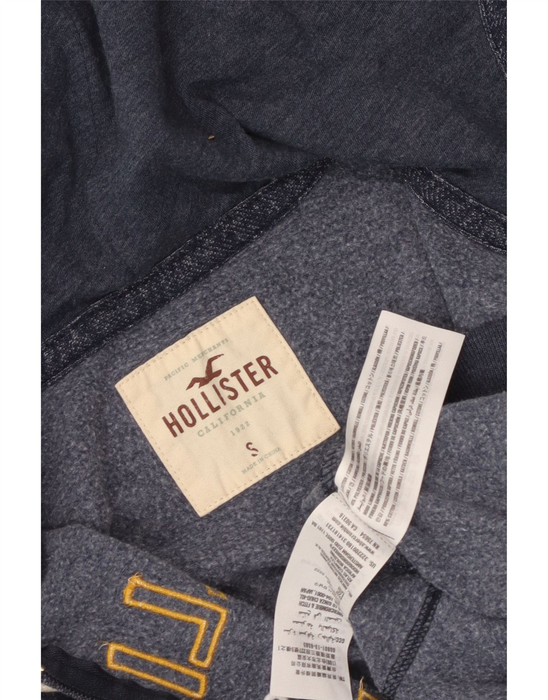 HOLLISTER Suéter con capucha y cremallera gráfica para hombre pequeño de algodón moteado en azul marino