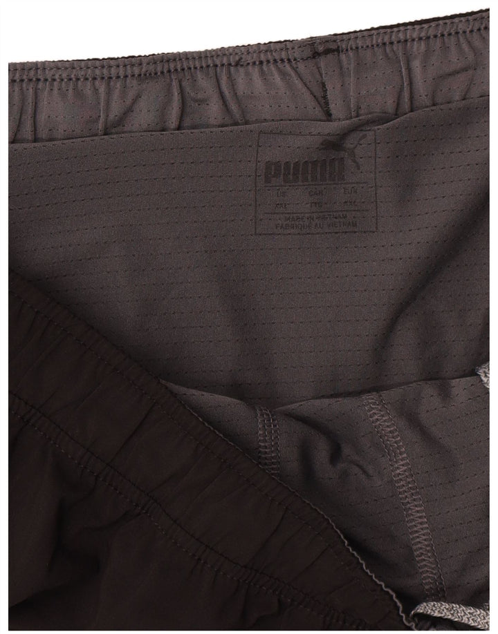 Puma Pantalones cortos deportivos gráficos para hombre 2XL Poliéster negro
