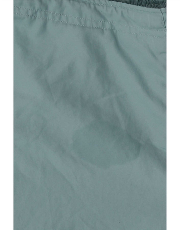 Adidas - Pantalón cortavientos para mujer (talla 40), color azul medio, poliéster