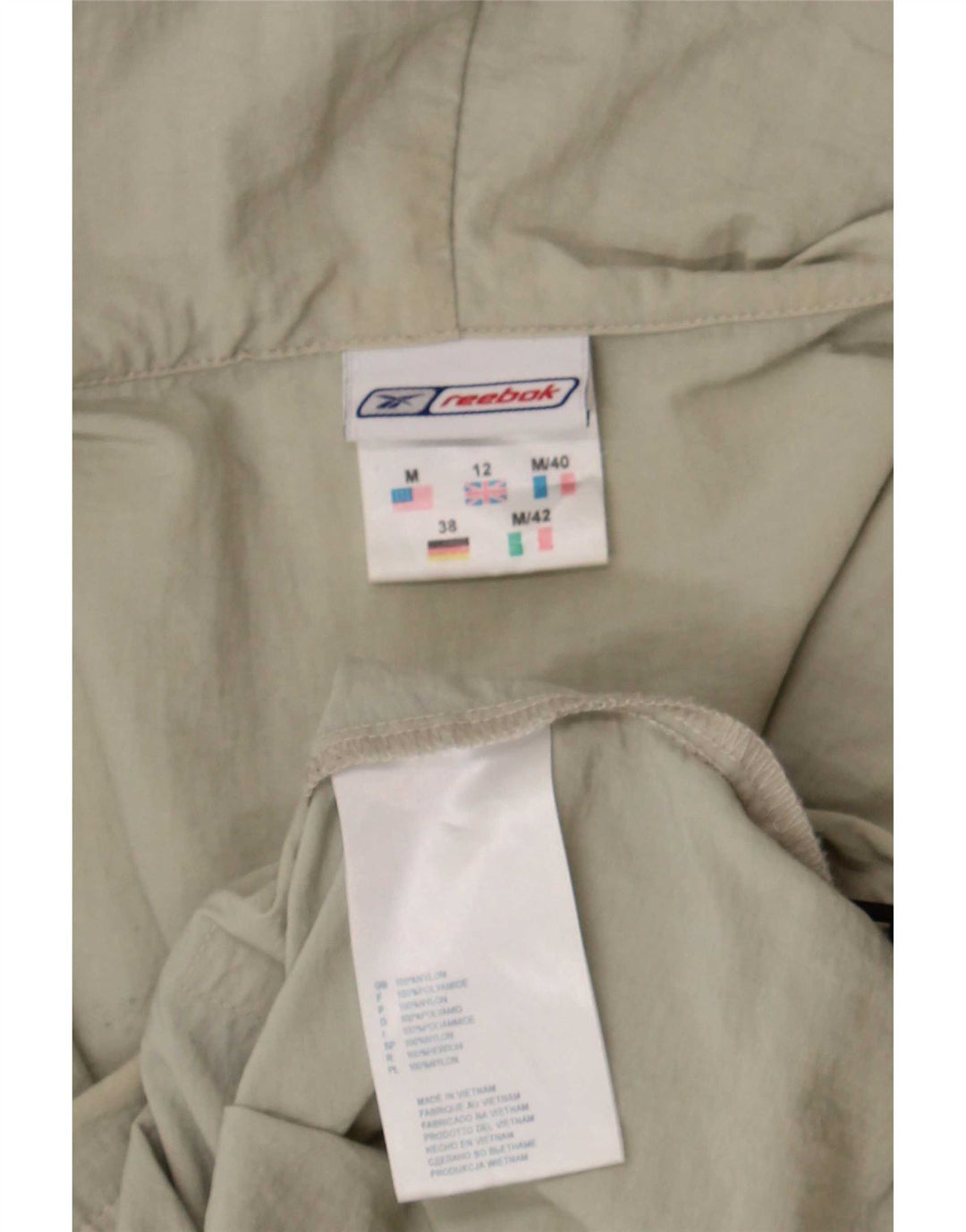 Reebok Chaqueta impermeable con capucha para mujer UK 12 Medium Beige Nylon